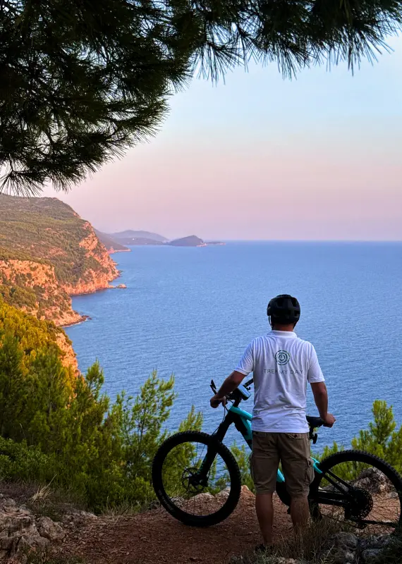 Solo e-bike rider enjoying coastal views on a Trek My Day rental in Konavle near Dubrovnik